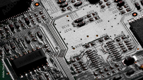 Close up of components and microchips on PC circuit board.