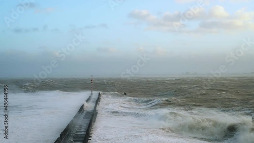 Waves overflowing above pier during storm Eunice, Vlissingen, Netherlands