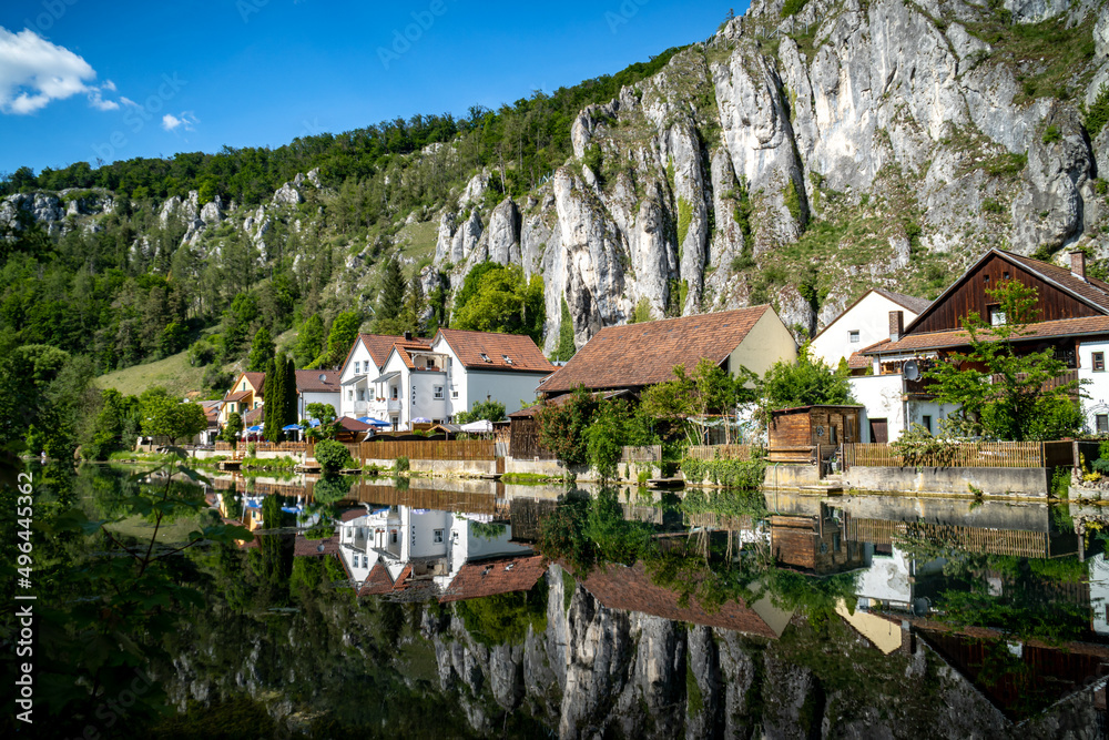 Naklejka premium Idyllic view of the village of Markt Essing in Bavaria, Germany in the Altmühltal on a sunny day in spring
