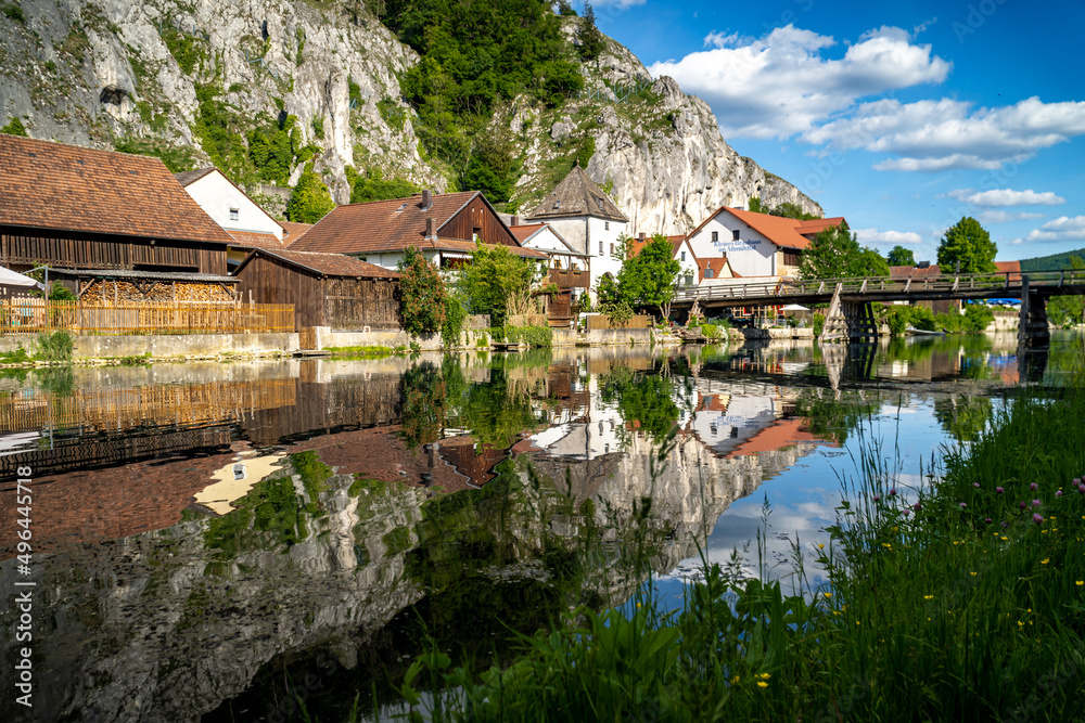 Fototapeta premium Idyllic view of the village of Markt Essing in Bavaria, Germany in the Altmühltal on a sunny day in spring