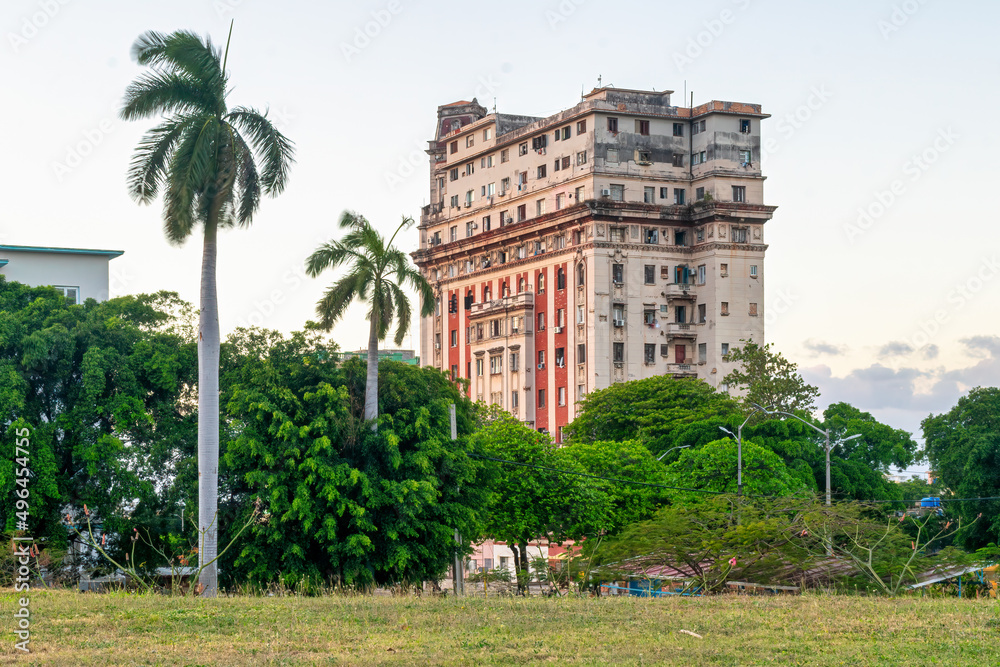 HAVANA, CUBA,  Weathered and run-down republican style apartment building in El Vedado downtown district. The scene is taken in 