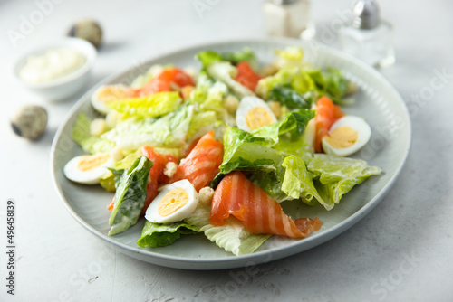 Homemade Caesar salad with salmon