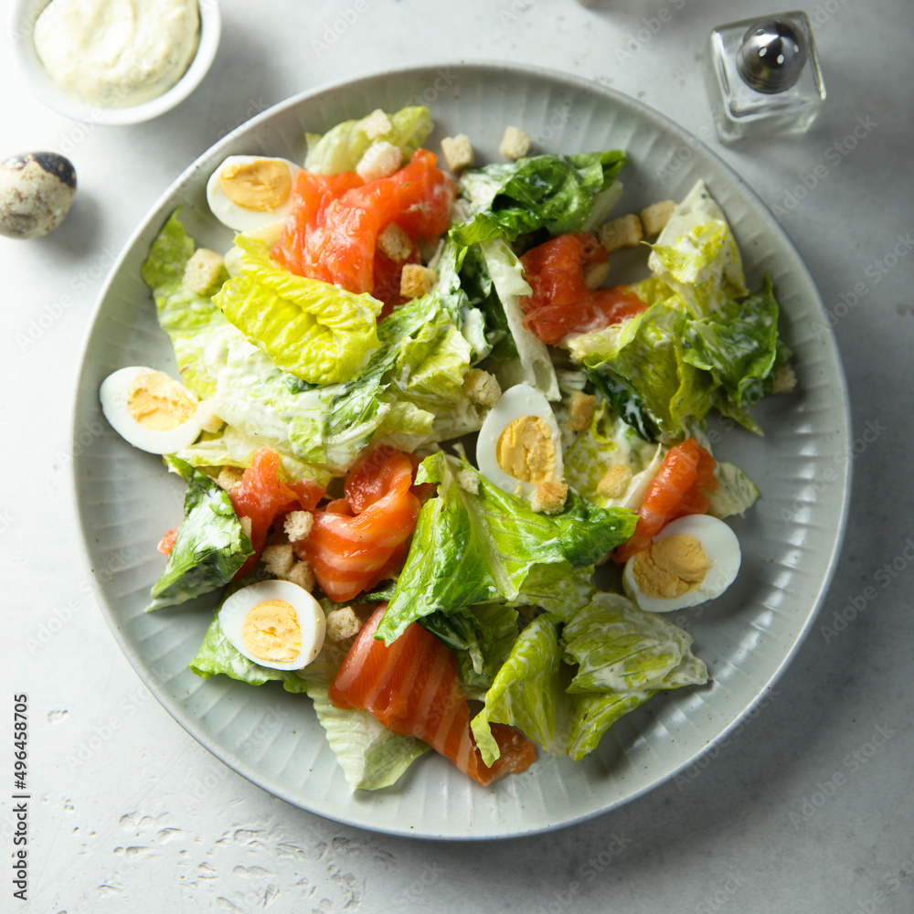 Homemade Caesar salad with salmon Homemade Caesar salad with salmon