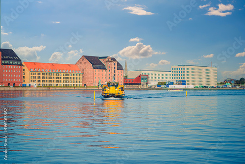 Photography Yellow Copenhagen Harbour water Bus floats along the canal near the old warehouses