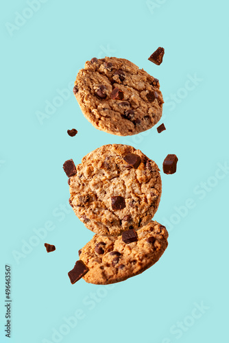 oatmeal chocolate chip cookies swirl on blue background