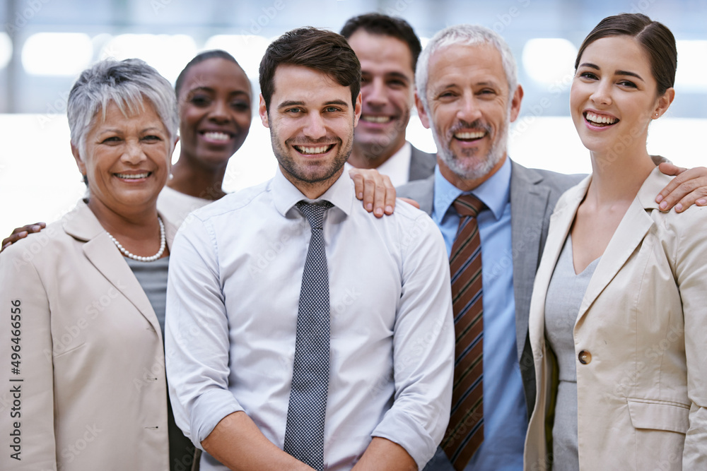 We the best in the business. Cropped portrait of a group of businesspeople standing in the office. We the best in the business. Cropped portrait of a group of businesspeople standing in the office.