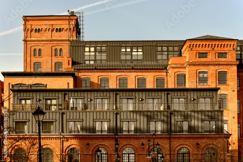 historic huge spinning mill factory built since 1824 , after revitalization it houses modern loft apartments, Ksiezy Mlyn, Tymienieckiego street, Lodz, Poland, Europe