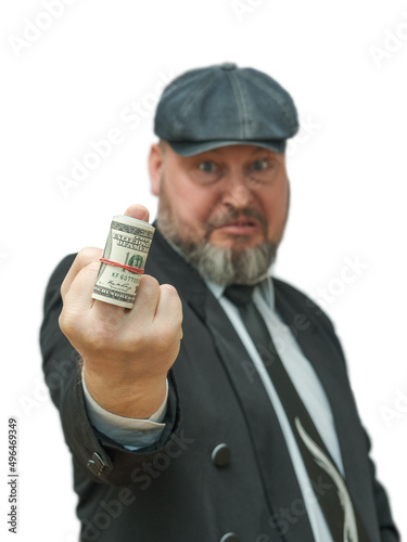 A man shows the middle finger with dollars.