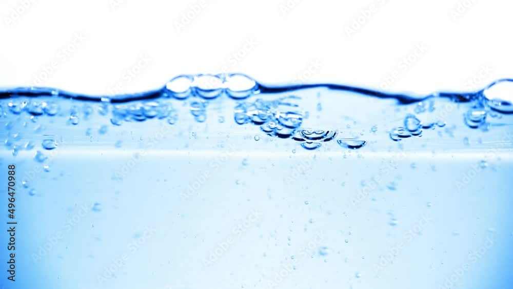 Many bubbles in water close up, abstract water wave with bubbles in slow motion Many bubbles in water close up, abstract water wave with bubbles in slow motion