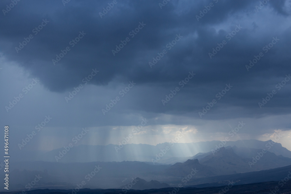 Sky, clouds and rain at blue hour
