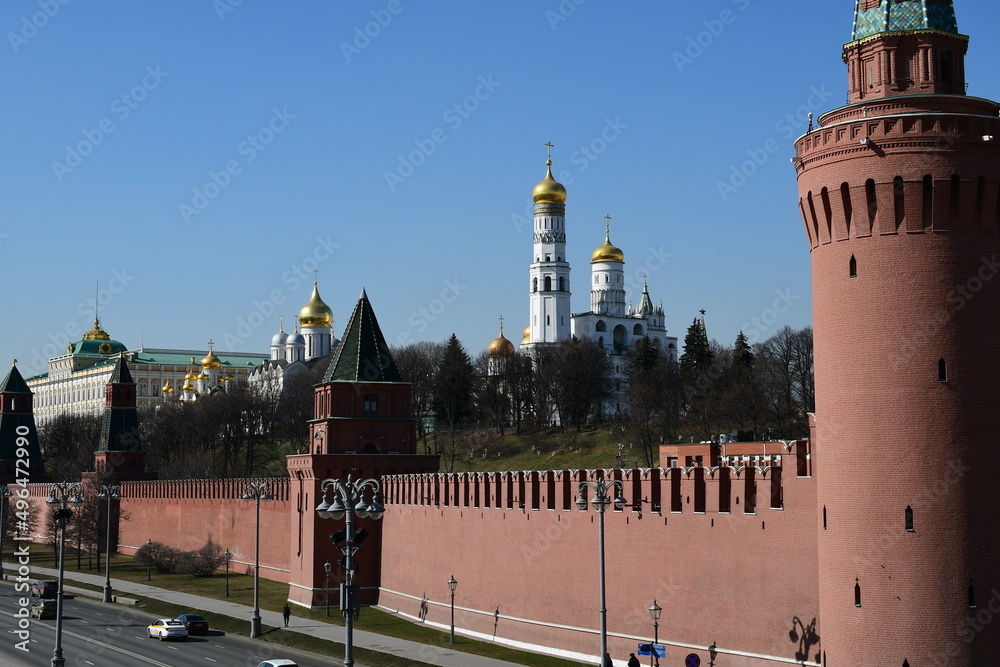 Panoramic view of the Kremlin wall and towers. View of churches with golden domes. 03.24. 2022 Moscow, Russia.