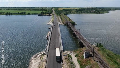 Wallpaper Mural Nikopol. Ukraine. Alekseevsky bridge from a drone. Repaired bridge after destruction. Torontodigital.ca