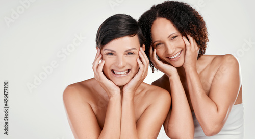 New faces, new beauty. Cropped portrait of two beautiful mature women posing against a grey background in studio.