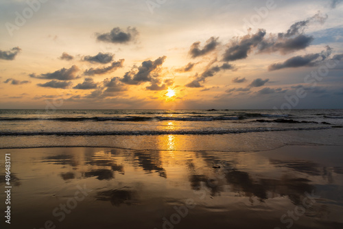 Dramatic sunset sky over the sea. Cloudy sunset and sunrise sky at sea concept image.