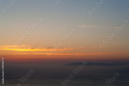 fog over the sea after sunset