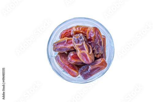 Top view date fruits in bowl on isolated white background