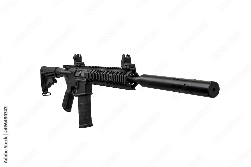 Modern automatic rifle isolated on black background. Weapons for police, special forces and the army. A carbine with mechanical sights and a silencer on a dark back.