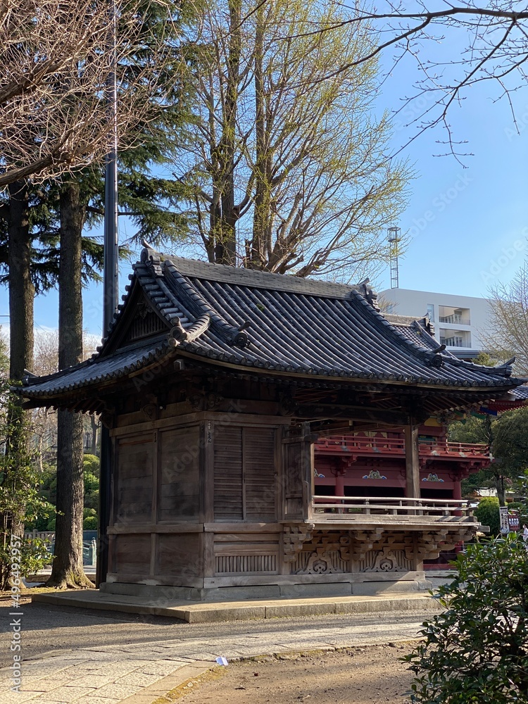 Japanese shrine architectural detail, wooden structure. Spring 2022, Nezu Shrine, Tokyo Japan Japanese shrine architectural detail, wooden structure. Spring 2022, Nezu Shrine, Tokyo Japan