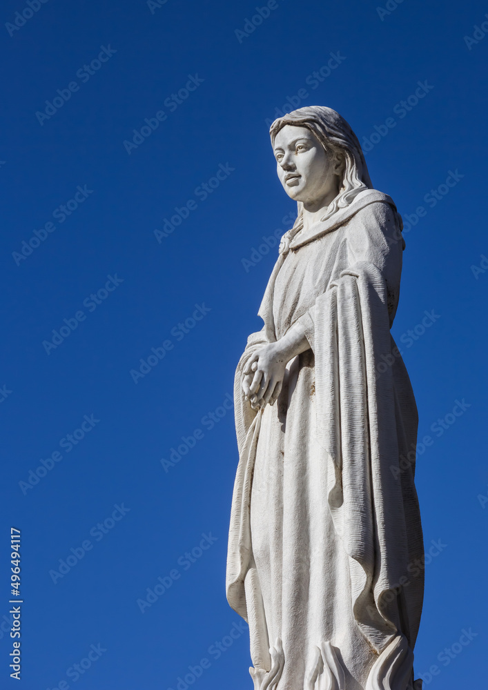 Statue of Santa Eulalia in historic city Merida, Spain