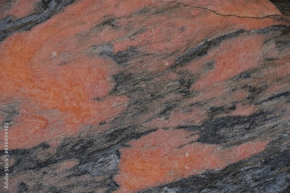 Dark gray and coral colors marble. Natural stone background.