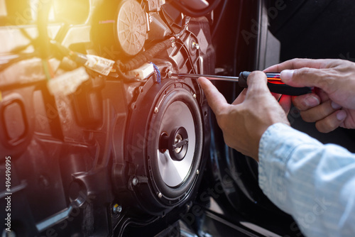 Technician installing the car speaker