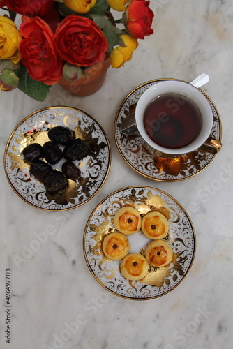Some Nastar cookies, sweet dates, and a cup of hot tea for Ramadan break fasting.