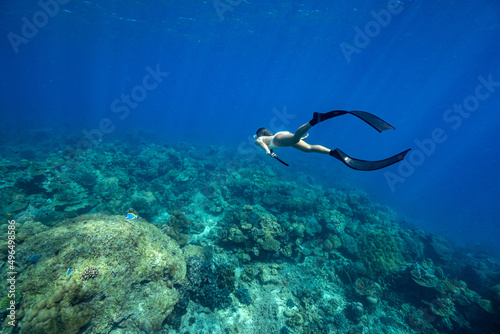 swimming freediving to coral reefs,Surin Island in Phangnga, Thailand. photo