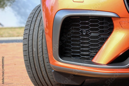 Close up of an orange car air intake photo