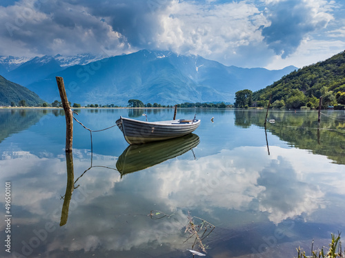 Boat on Mera river from Dascio photo