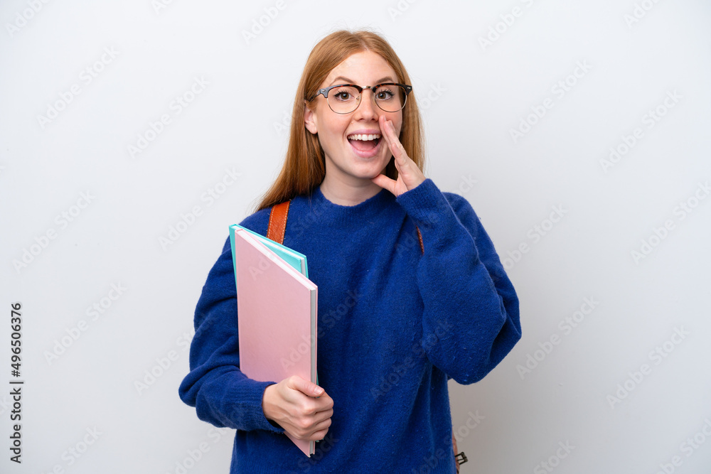 Young student redhead woman isolated on white background with surprise and shocked facial expression Young student redhead woman isolated on white background with surprise and shocked facial expression