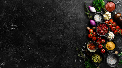 background of cooking. Spices and vegetables. Top view. Free space for your text.