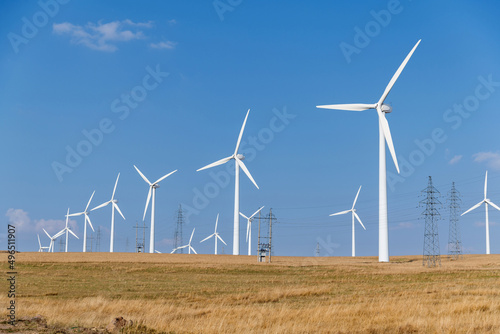Wind turbines on autumn landsape