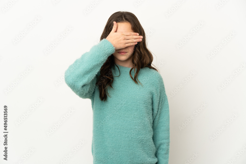 Little caucasian girl isolated on white background covering eyes by hands. Do not want to see something Little caucasian girl isolated on white background covering eyes by hands. Do not want to see something