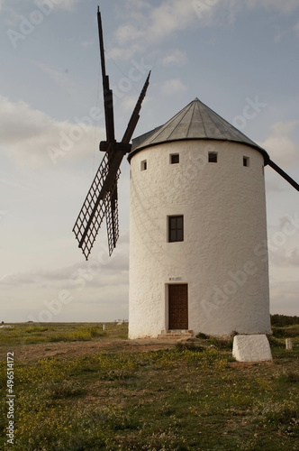 Windmills type "tower" Campo de Criptana (Ciudad Real), with windows and whitewashed with lime. They have three floors: the upper floor with the millstones and the lower floors for storage and packagi
