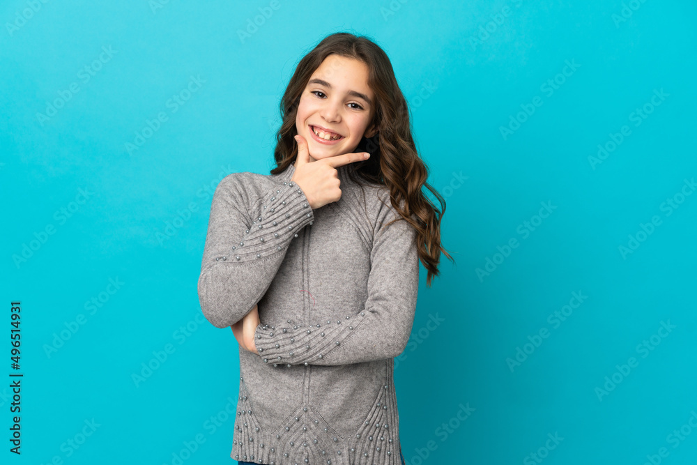 Little caucasian girl isolated on blue background happy and smiling Little caucasian girl isolated on blue background happy and smiling