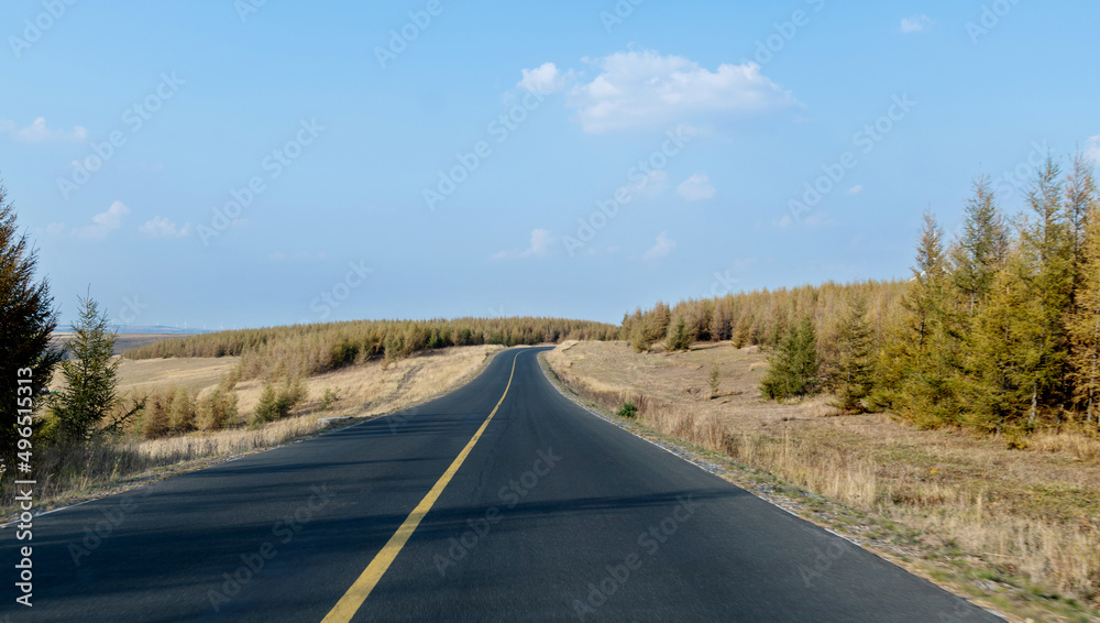 Country road with blue sky in the autumn Country road with blue sky in the autumn
