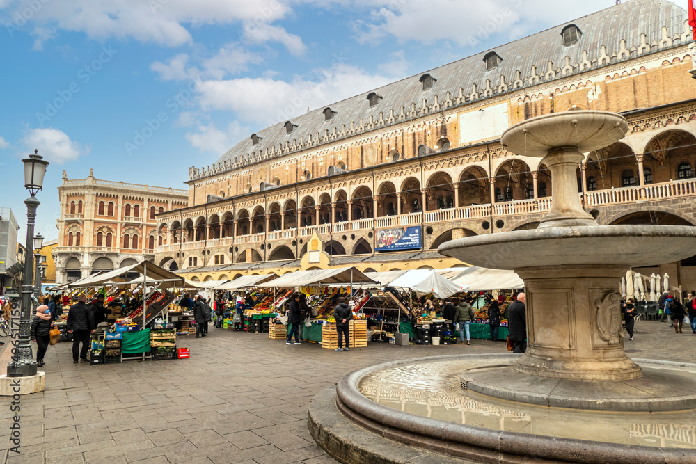 Piazza delle Erbe with the historic Padua market and the splendid Palazzo della Regione in the background