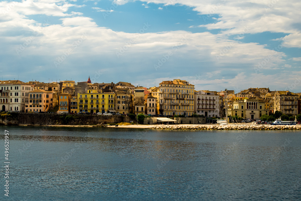 Fototapeta premium corfu city port and houses view from ship greece