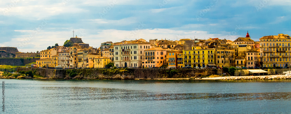 Naklejka premium corfu city port and houses view from ship greece