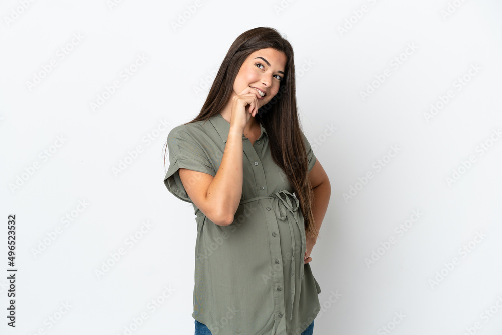 Young Brazilian woman isolated on white background pregnant and thinking Young Brazilian woman isolated on white background pregnant and thinking