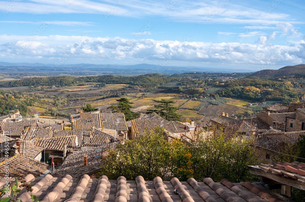 View on old roofs, hills and vineyards from old town Montepulciano, Tuscany, Italy