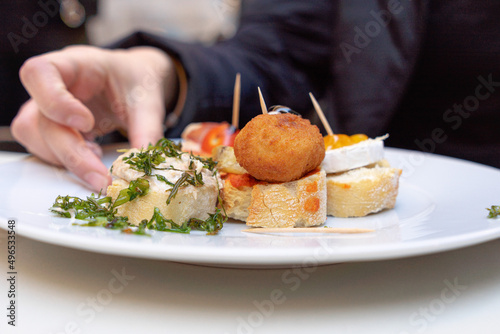 Typical Spanish aperitif with beer and pinchos. Typical tapas from Valencia