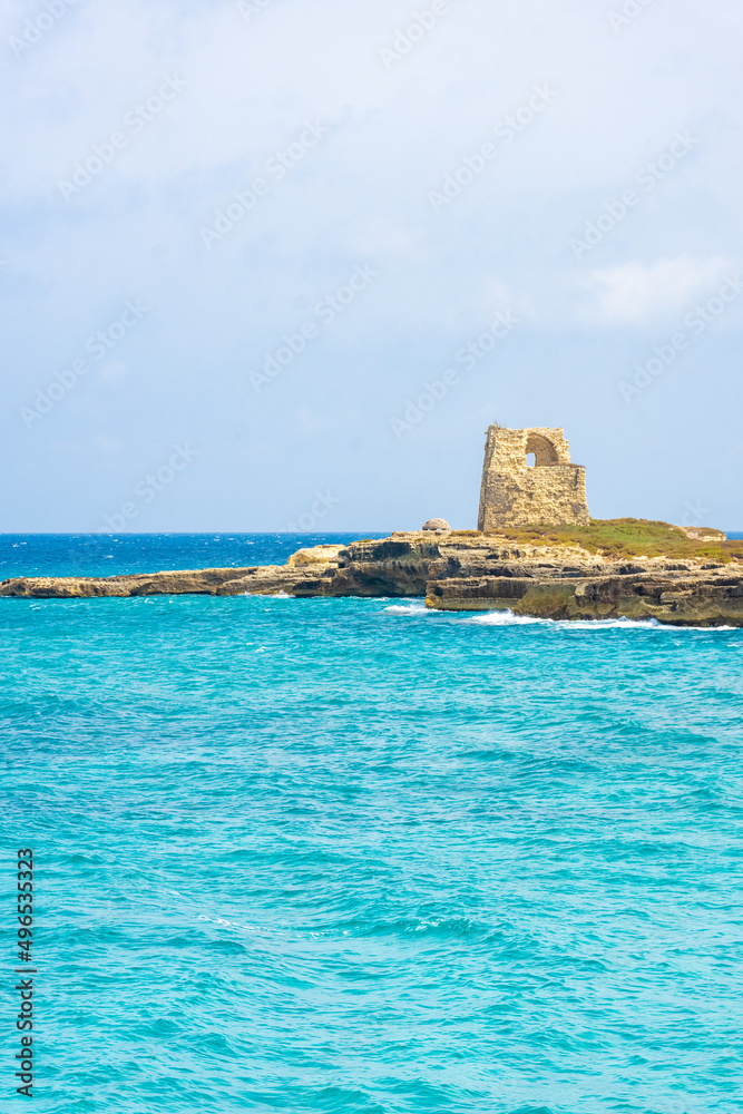 Ancient tower on the cliffs on the beautiful sea of Torre dell'Orso, Apulia Salento, Italy