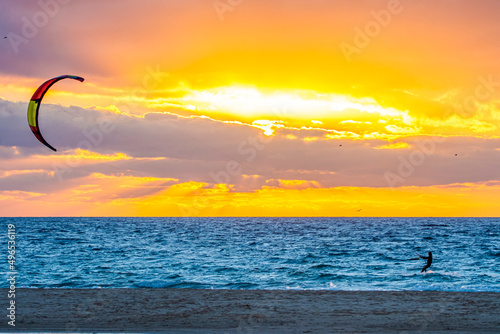 A man that practice kitesurf during in a sunset in tarifa, Spain