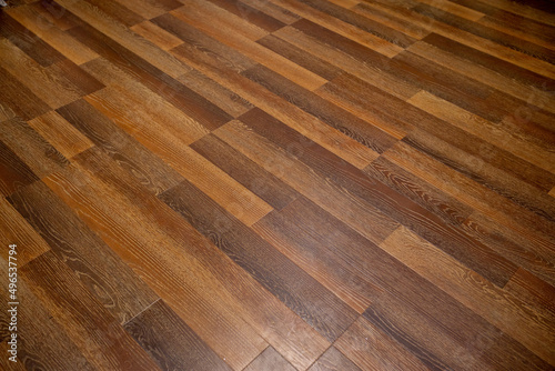 Brown laminate.Wooden striped textured background.