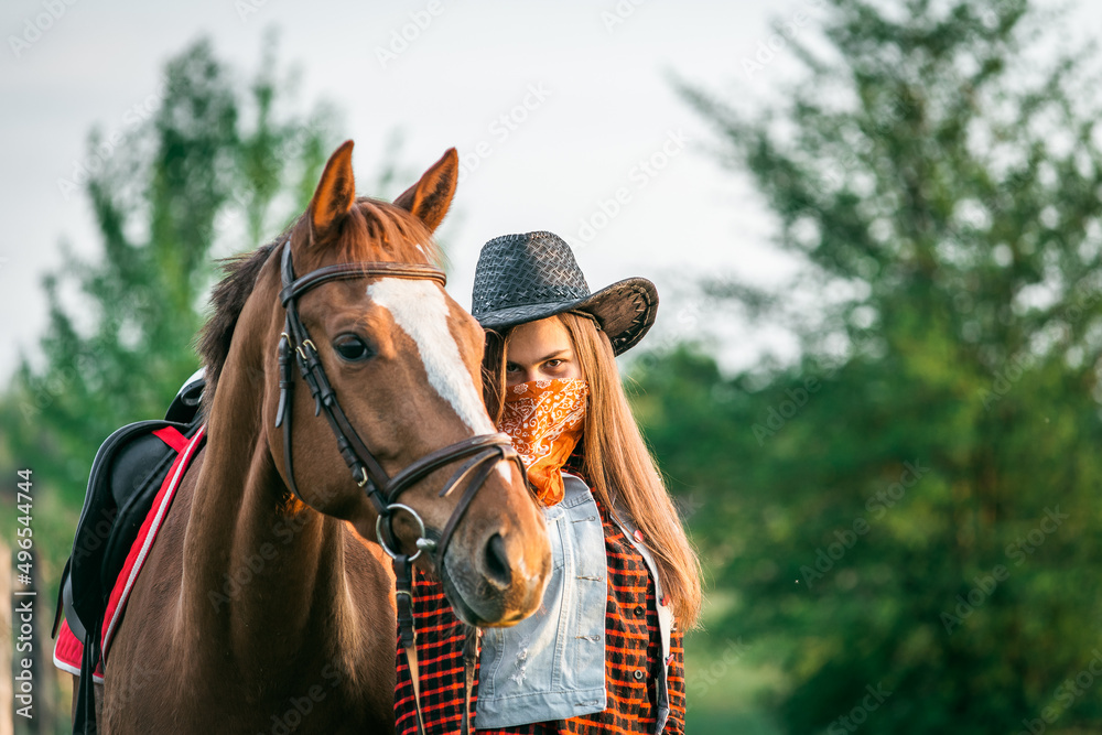 Fototapeta premium cowgirl and horse