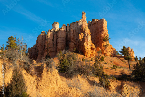 Landscape photograph of the Mossy Cave area of Bryce Canyon National Park in Utah at sunrise.