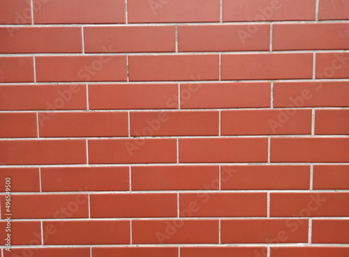Brick wall with red bricks, red brick background