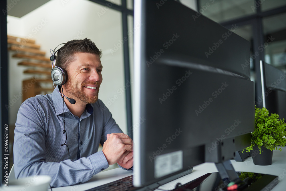 Ill help you sort the problem out. Shot of a mature man working on a computer in a call centre. Ill help you sort the problem out. Shot of a mature man working on a computer in a call centre.