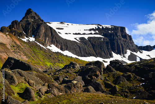 The big boulders and jagged peaks of the Dyrfjoll range, Storurd valley, East Fjords, Iceland